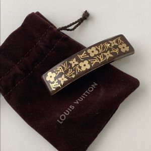 Louis Vuitton monogram hair clip.